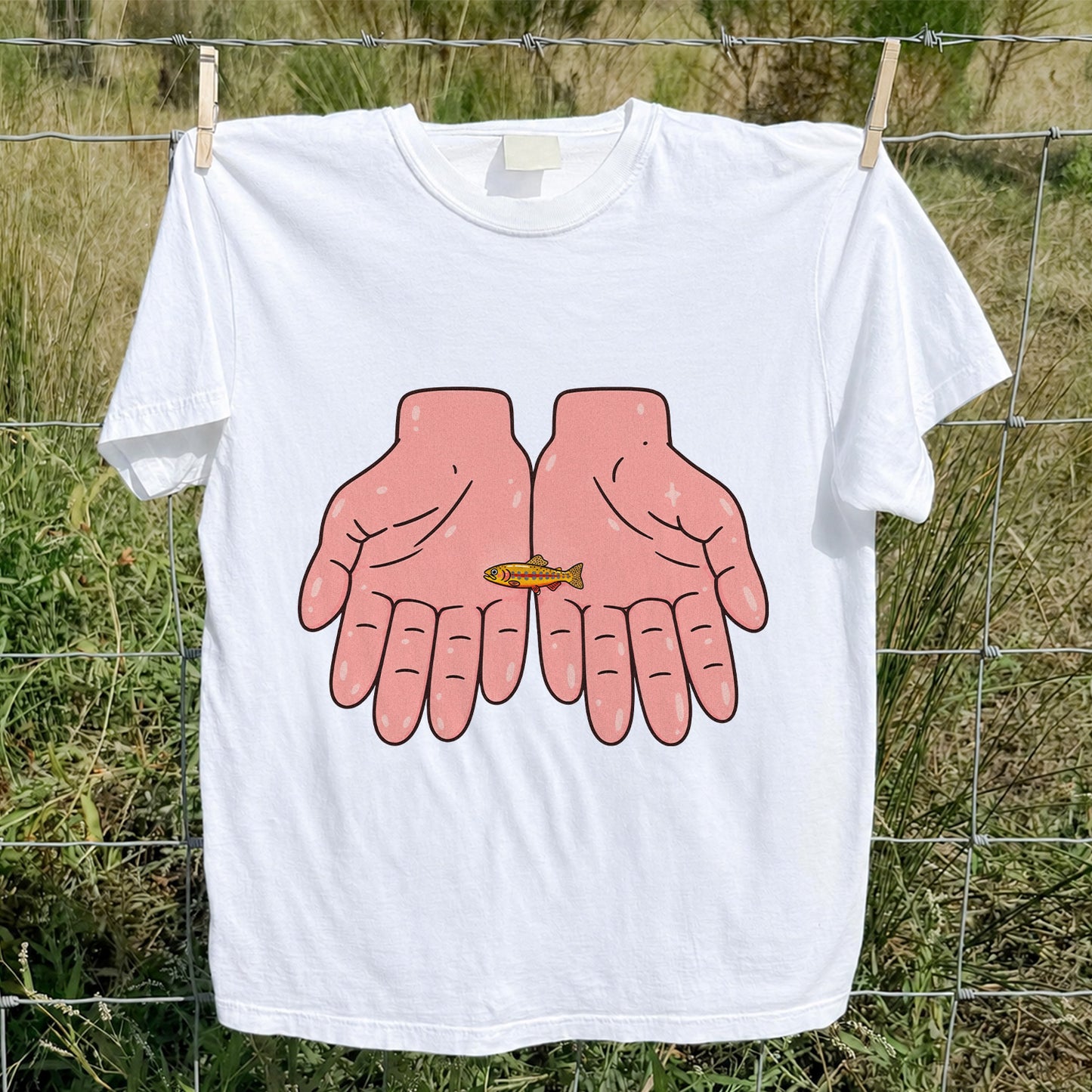 Tiny Rainbow Trout in Two Hands Cute Fishing Graphic T-Shirt