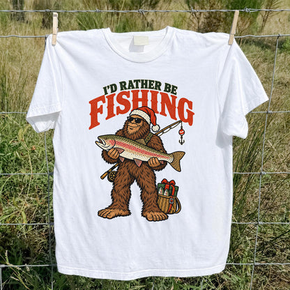 I'd Rather Be Fishing Bigfoot Holding Rainbow Trout Christmas T-Shirt