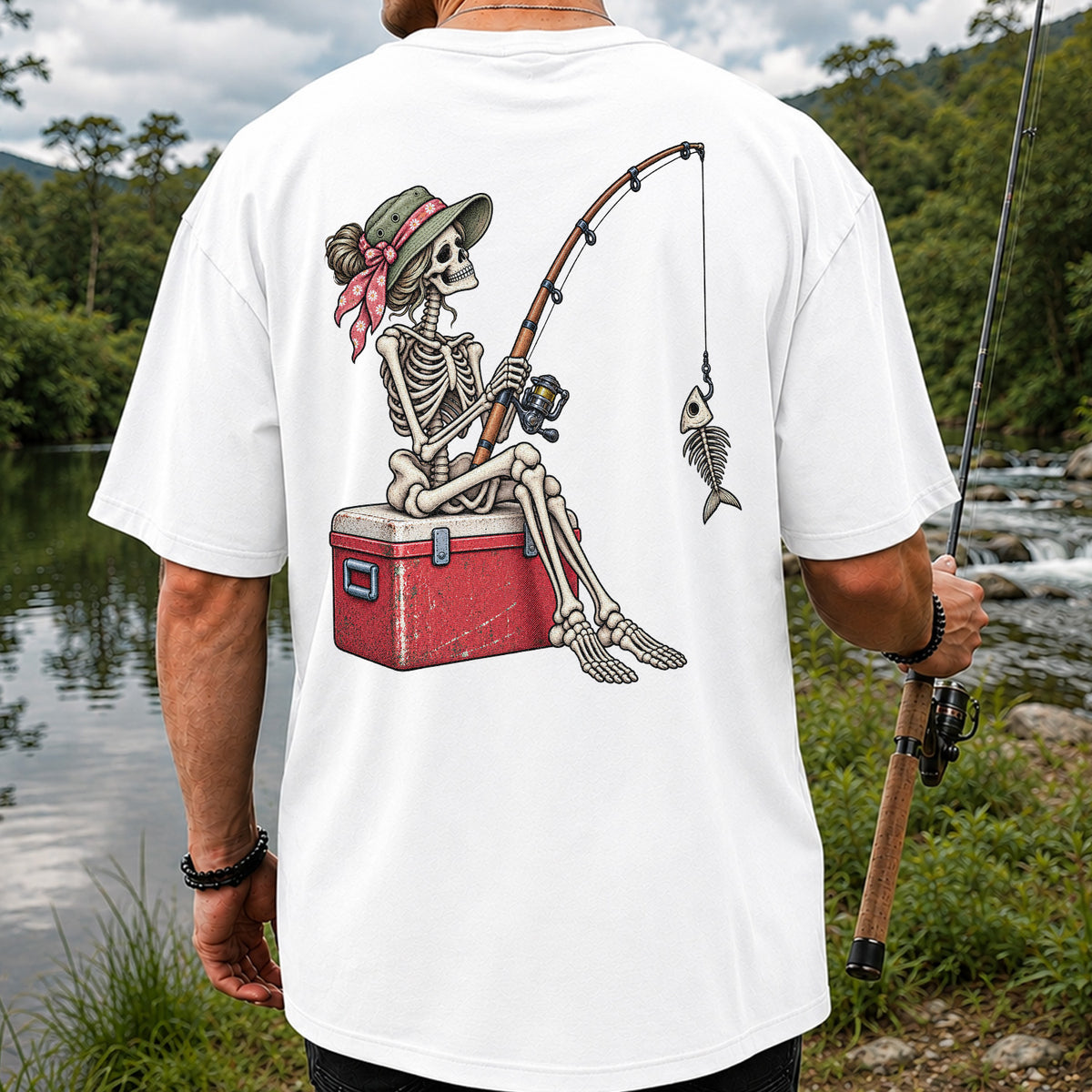 Skeleton Woman Fishing on a Cooler with Fish Bones Graphic T-Shirt | Back Print