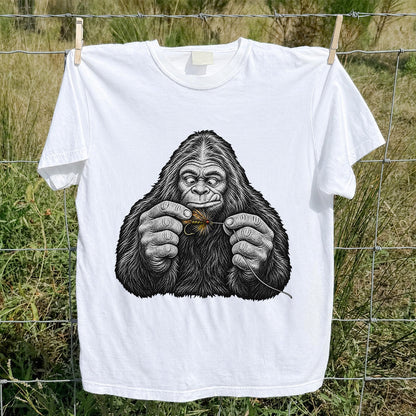 Bigfoot Tying a Fly Fishing Lure Graphic T-Shirt