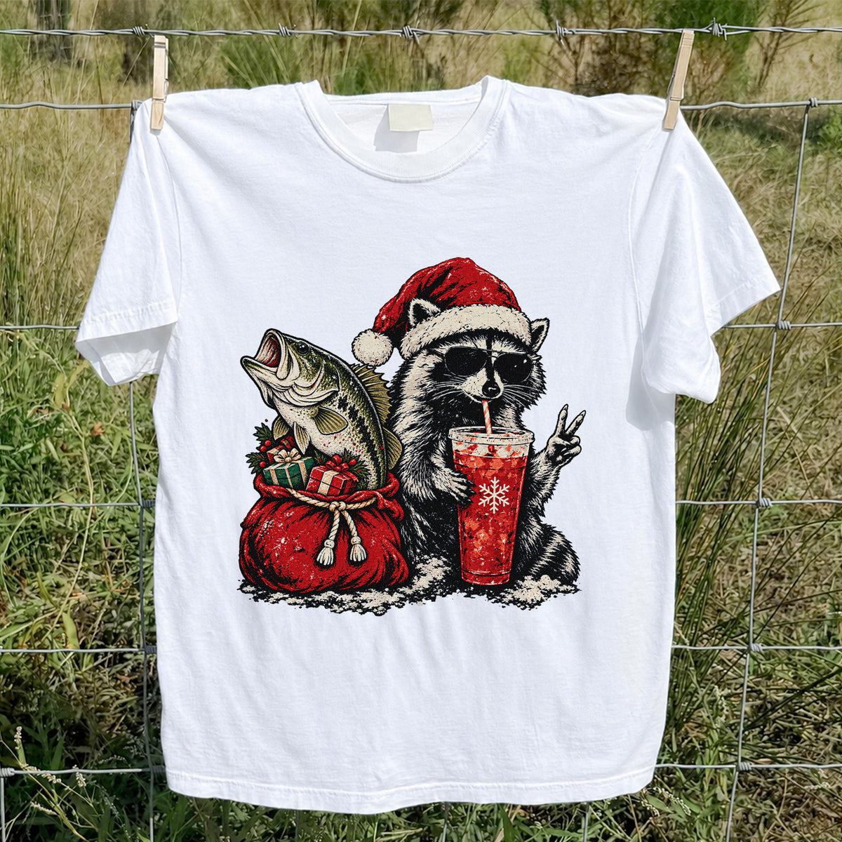 Santa Raccoon Sharing a Bass Christmas Fishing Graphic T-Shirt