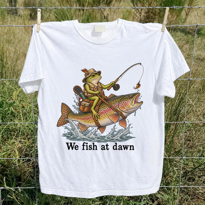 We Fish at Dawn Frog Riding a Rainbow Trout Funny Fishing T-Shirt