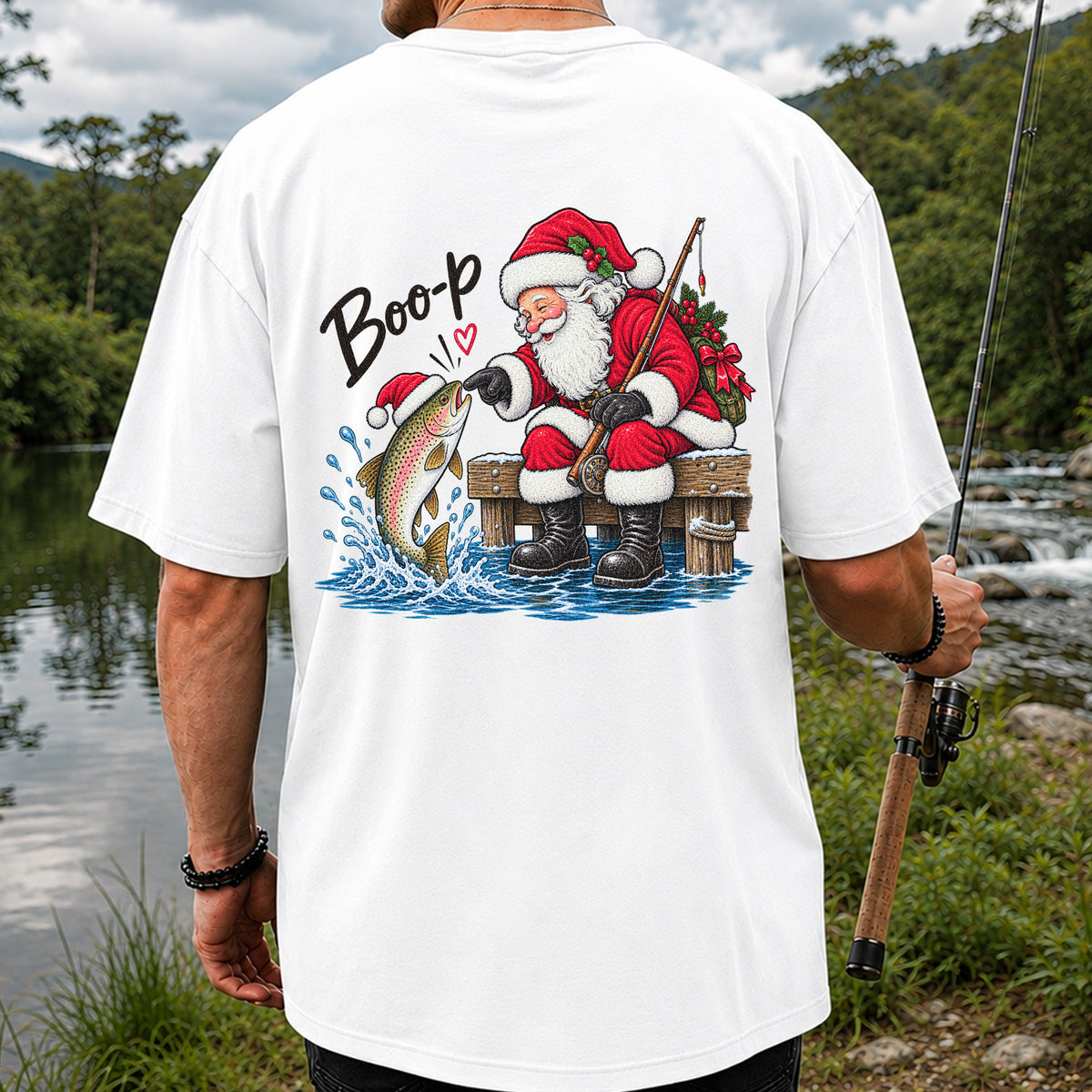 Santa Fishing for Rainbow Trout Christmas Graphic T-Shirt | Back Print