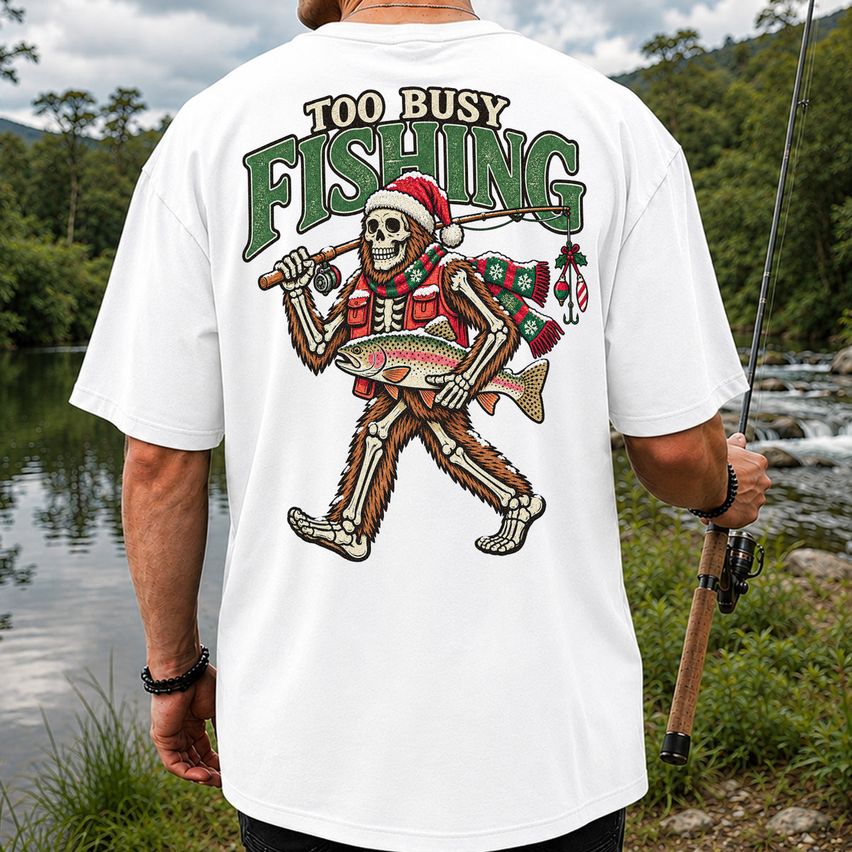 Too Busy Fishing Bigfoot Skeleton Christmas Trout T-Shirt | Back Print