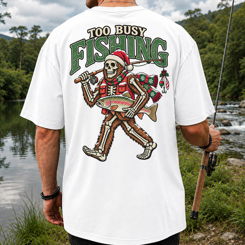 Too Busy Fishing Bigfoot Skeleton Christmas Trout T-Shirt | Back Print