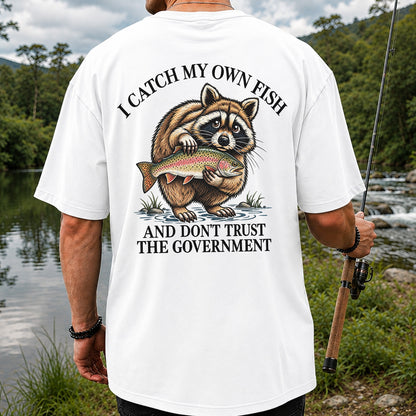 Raccoon Holding Rainbow Trout Fishing Graphic T-Shirt | Back Print