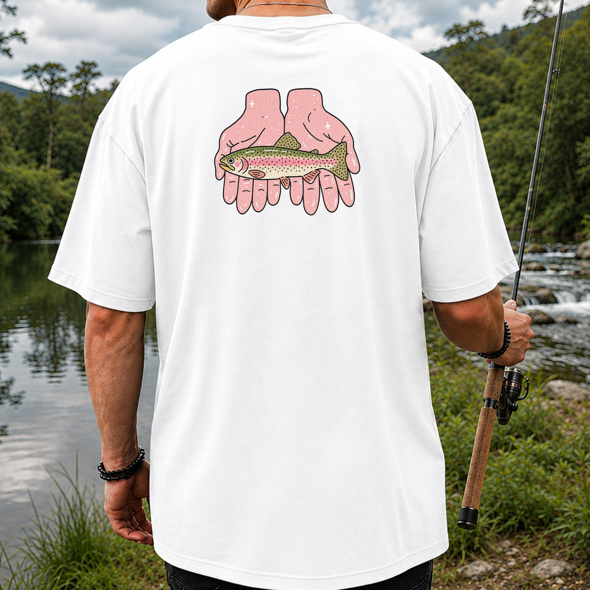 Rainbow Trout Held in Pink Hands Fishing Graphic T-Shirt | Back Print